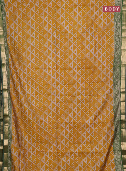 Semi maheshwari cotton saree mustard yellow and green with allover geometric prints and zari woven border