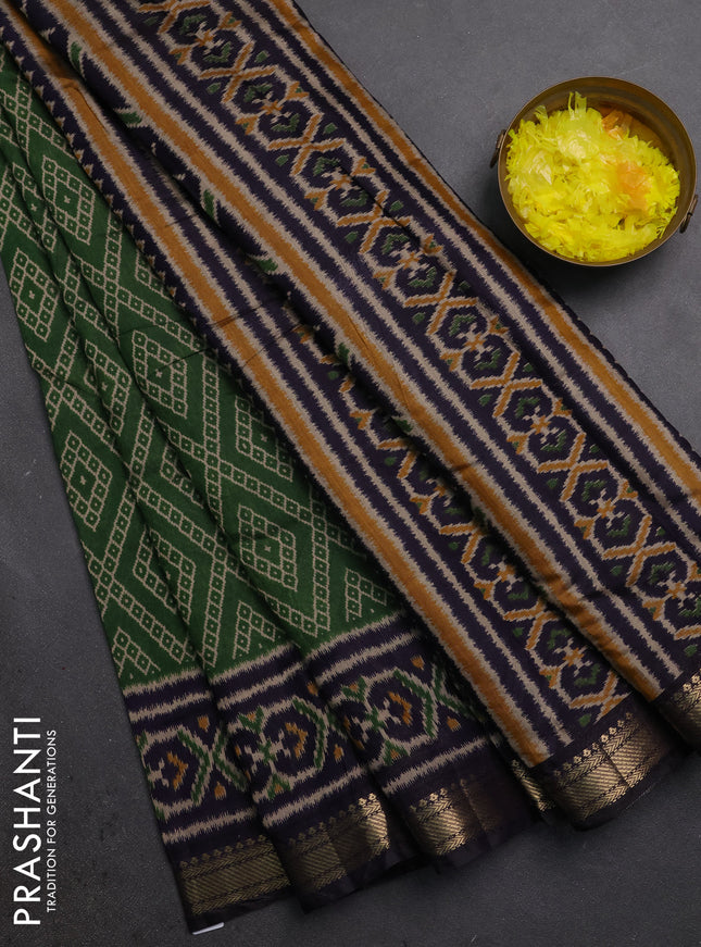 Semi maheshwari cotton saree green and navy blue with allover geometric prints and ikat zari woven border