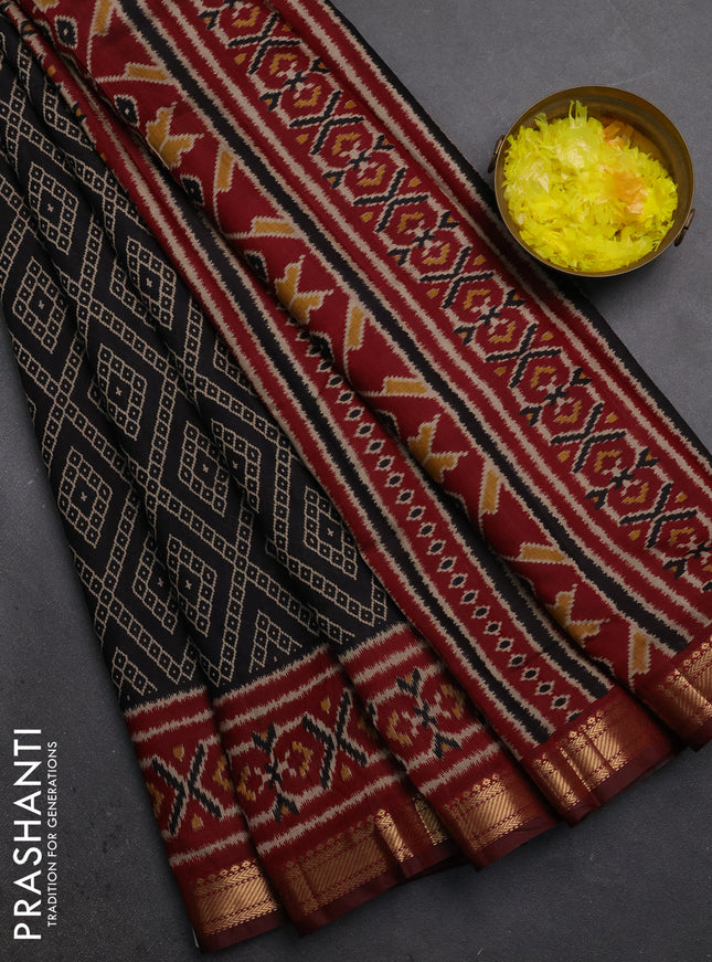 Semi maheshwari cotton saree black and maroon with allover geometric prints and ikat zari woven border