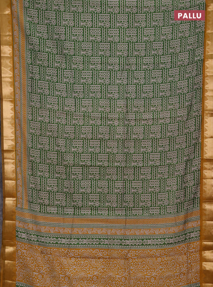 Semi maheshwari cotton saree green and mustard yellow with allover prints and temple zari woven border
