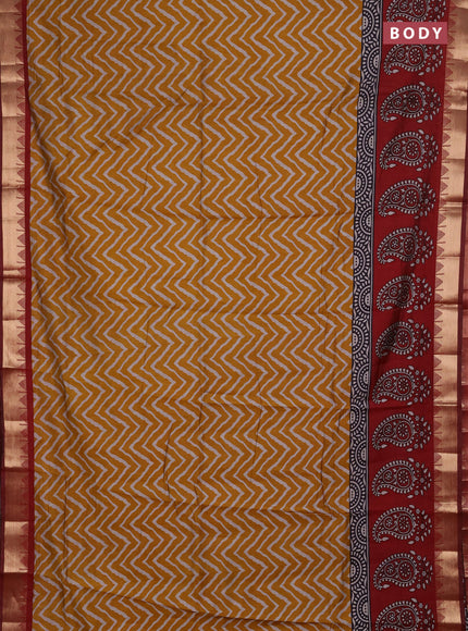 Semi maheshwari cotton saree mustard yellow and maroon with allover zigzag prints and zari woven border