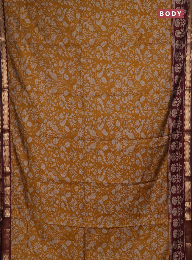 Semi maheshwari cotton saree mustard yellow and wine shade with allover kalamkari prints and zari woven border