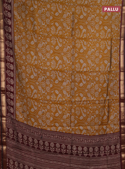 Semi maheshwari cotton saree mustard yellow and wine shade with allover kalamkari prints and zari woven border