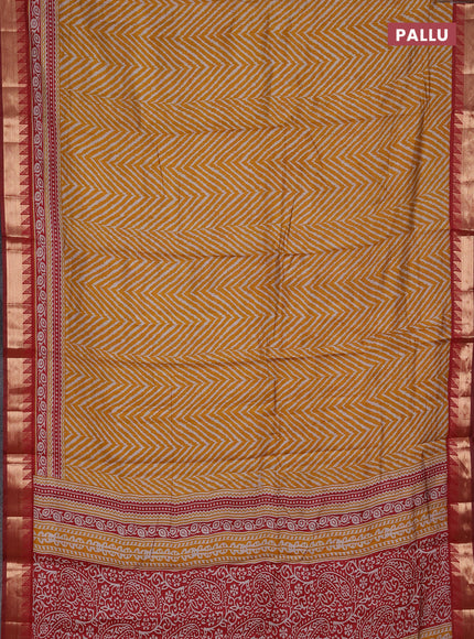 Semi maheshwari cotton saree mustard yellow and maroon with allover zigzag prints and zari woven border