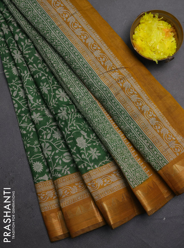 Semi maheshwari cotton saree light green and mustard yellow with allover floral prints and zari woven border