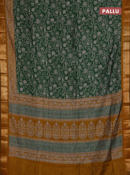Semi maheshwari cotton saree light green and mustard yellow with allover floral prints and zari woven border