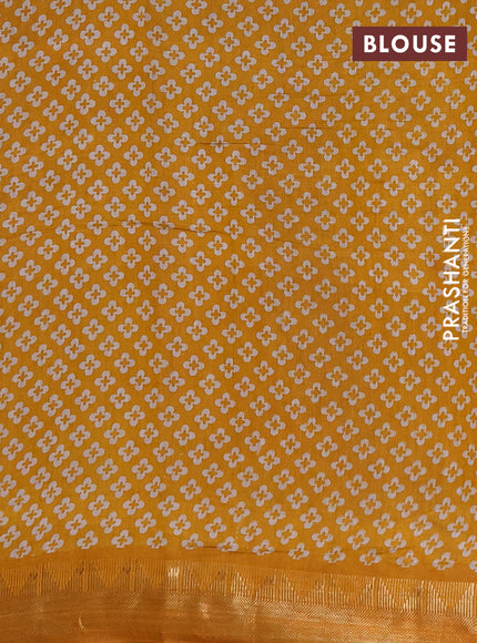 Semi maheshwari cotton saree light green and mustard yellow with allover floral prints and zari woven border
