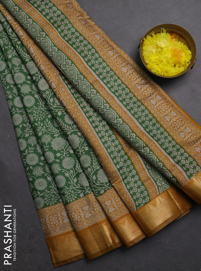 Semi maheshwari cotton saree light green and mustard yellow with allover floral prints and zari woven border