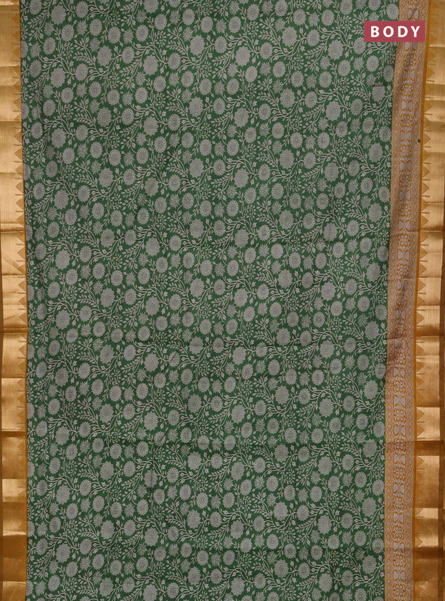 Semi maheshwari cotton saree light green and mustard yellow with allover floral prints and zari woven border