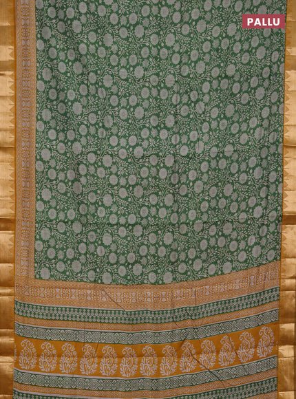 Semi maheshwari cotton saree light green and mustard yellow with allover floral prints and zari woven border