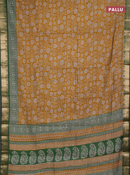 Semi maheshwari cotton saree mustard yellow and light green with allover floral prints and zari woven border