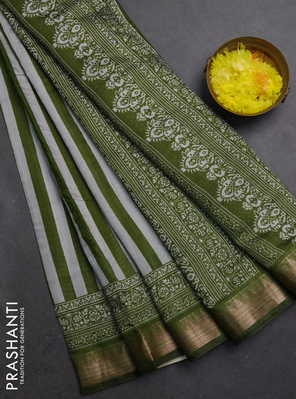 Semi maheshwari cotton saree light green grey with allover stripe pattern and zari woven border