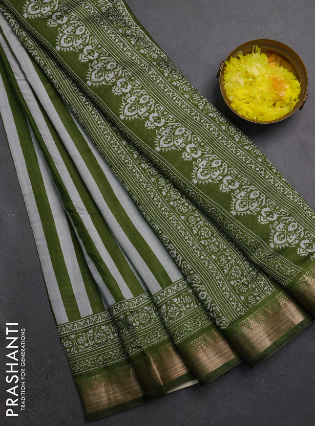 Semi maheshwari cotton saree light green grey with allover stripe pattern and zari woven border
