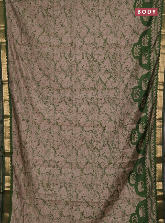 Semi maheshwari cotton saree beige and green with allover batik prints and zari woven border