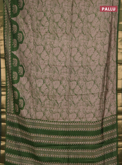 Semi maheshwari cotton saree beige and green with allover batik prints and zari woven border