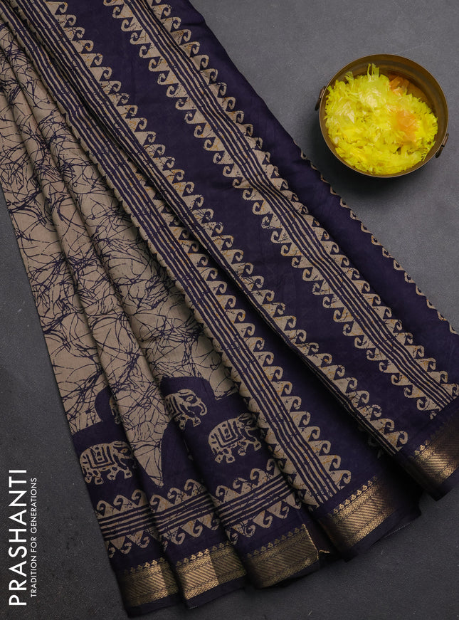 Semi maheshwari cotton saree beige and navy blue with allover batik prints and zari woven border
