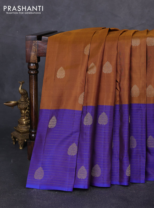 Pure kanchipuram silk saree dark mustard and blue with zari woven buttas and long rich zari woven border