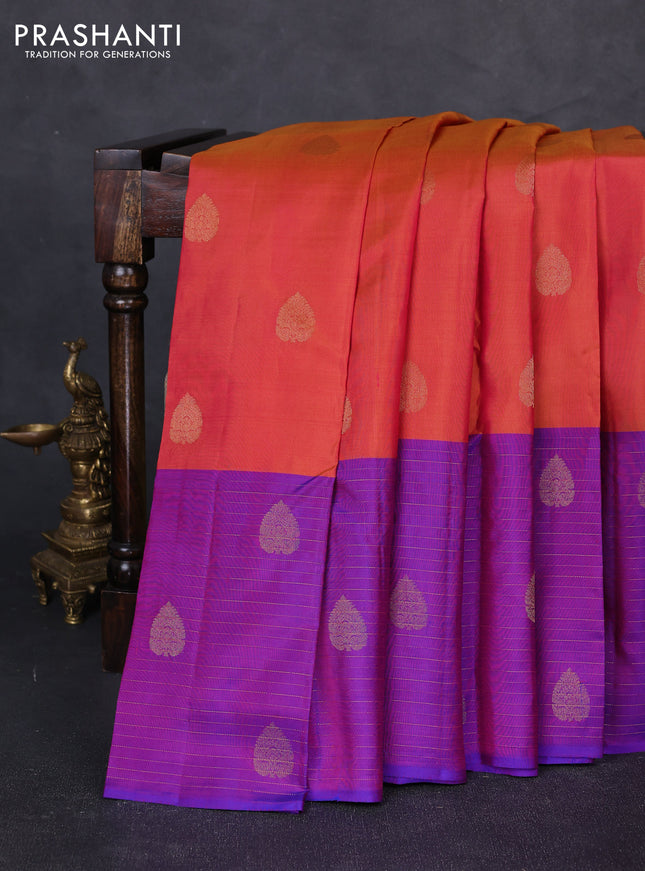 Pure kanchipuram silk saree dual shade of pinkish orange and purple with zari woven buttas and long rich zari woven border