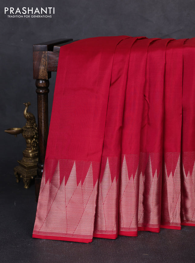 Pure kanchipuram silk saree reddish pink with plain body and temple design zari woven border
