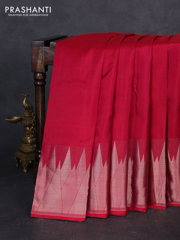 Pure kanchipuram silk saree reddish pink with plain body and temple design zari woven border