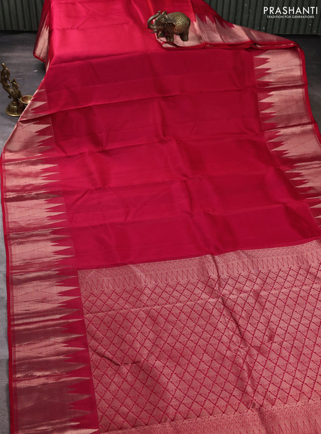 Pure kanchipuram silk saree reddish pink with plain body and temple design zari woven border