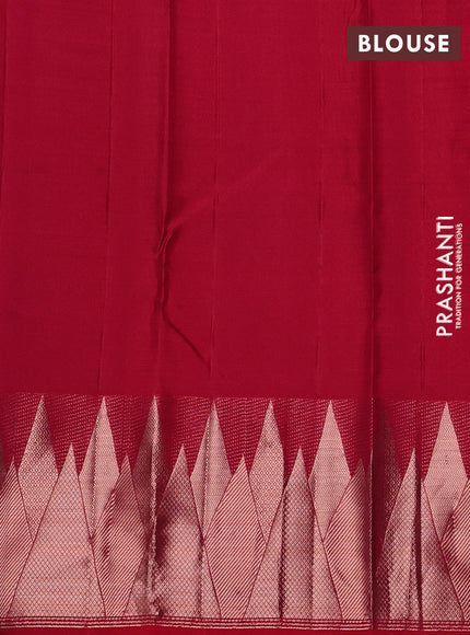 Pure kanchipuram silk saree reddish pink with plain body and temple design zari woven border