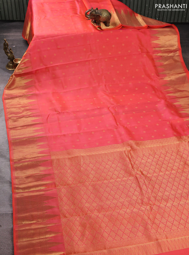 Pure kanchipuram silk saree peach orange with allover zari woven 1000 buttas and temple design zari woven border