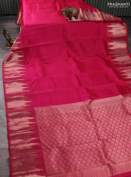 Pure kanchipuram silk saree dark pink with plain body and temple design zari woven border