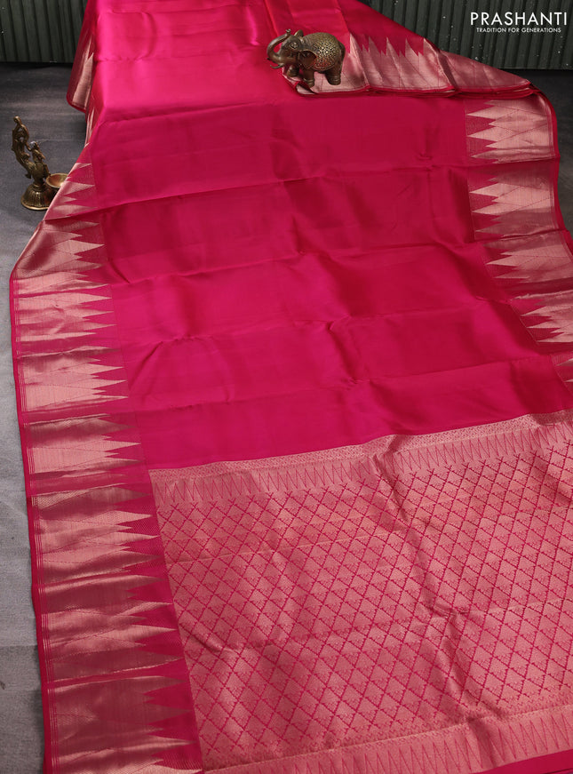 Pure kanchipuram silk saree dark pink with plain body and temple design zari woven border
