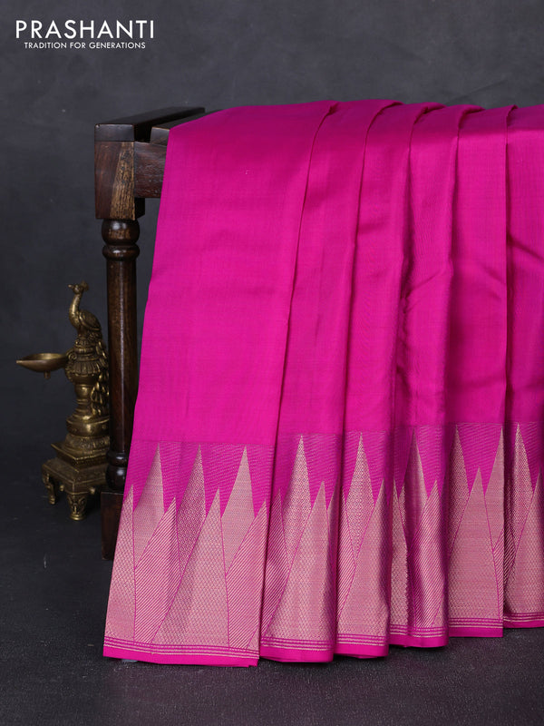 Pure kanchipuram silk saree pink with plain body and temple design zari woven border