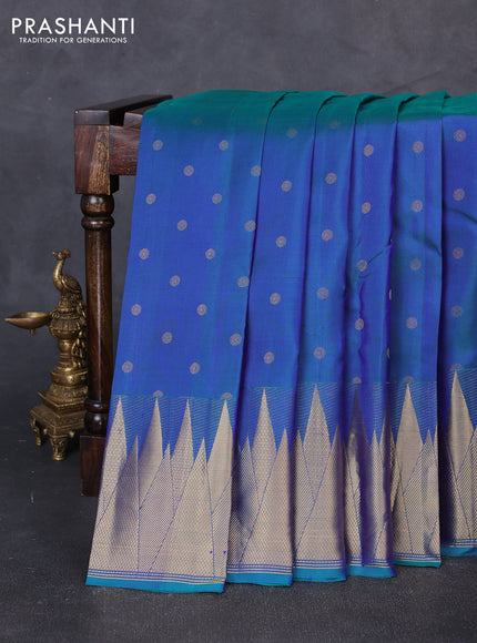 Pure kanchipuram silk saree dual shade of bluish green with allover zari woven 1000 buttas and temple design zari woven border