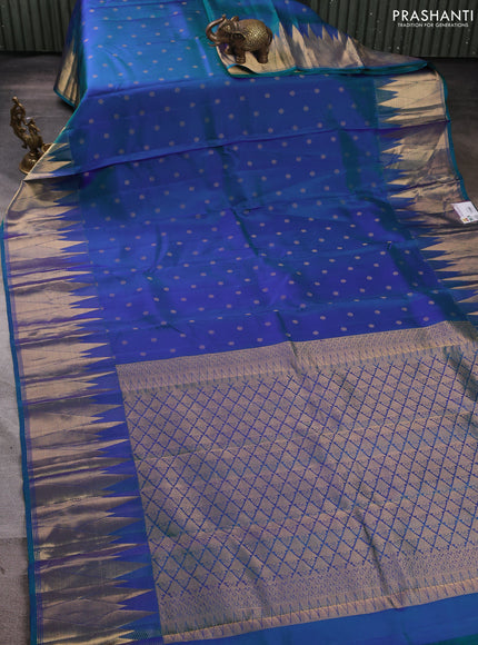 Pure kanchipuram silk saree dual shade of bluish green with allover zari woven 1000 buttas and temple design zari woven border