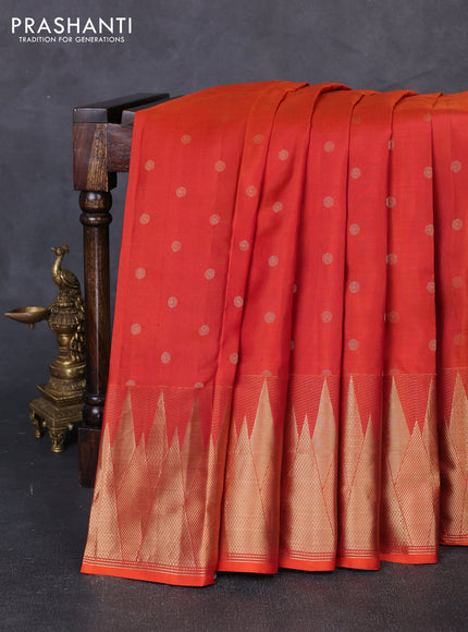Pure kanchipuram silk saree rustic orange with allover zari woven 1000 buttas and temple design zari woven border