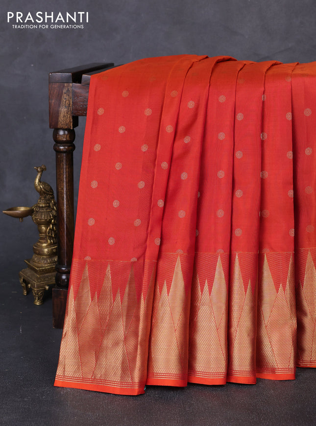 Pure kanchipuram silk saree rustic orange with allover zari woven 1000 buttas and temple design zari woven border