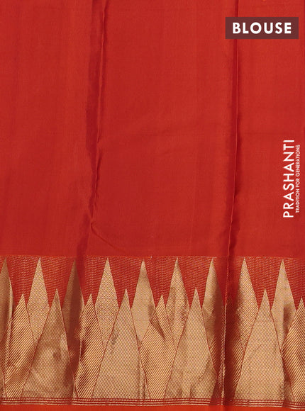 Pure kanchipuram silk saree rustic orange with allover zari woven 1000 buttas and temple design zari woven border