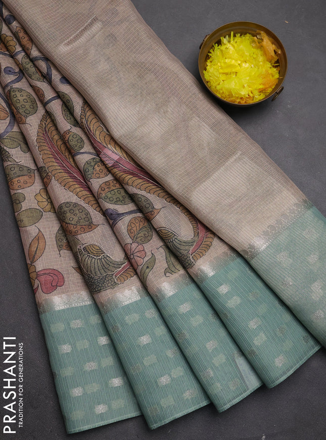 Art kota saree beige and pastel green with allover kalamari prints & embroidery work and zari woven border