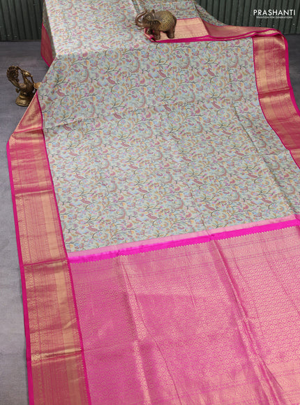 Pure kanchipuram silk saree pastel green and pink with allover digital prints and rich zari woven border