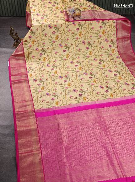 Pure kanchipuram silk saree pale yellow and pink with allover floral digital prints and rich zari woven border