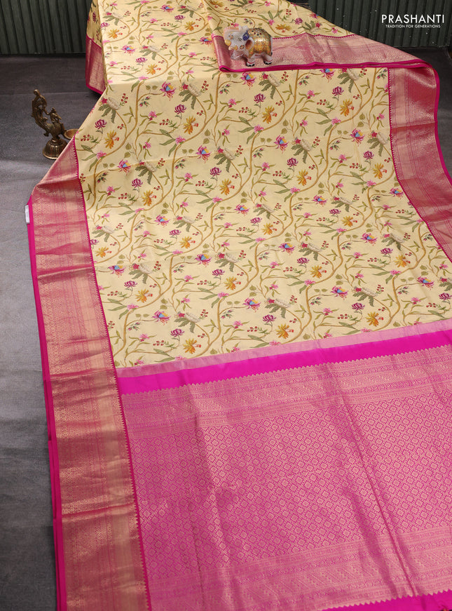 Pure kanchipuram silk saree pale yellow and pink with allover floral digital prints and rich zari woven border