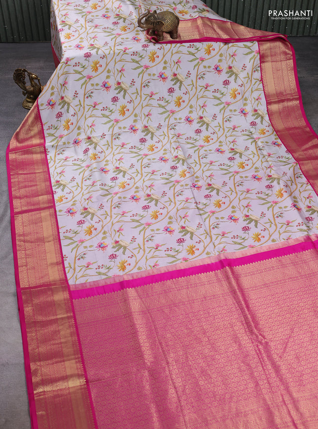 Pure kanchipuram silk saree pastel grey and pink with allover floral digital prints and rich zari woven border