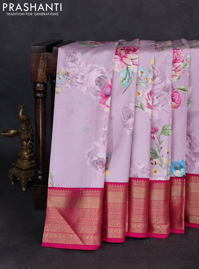 Pure kanchipuram silk saree pastel pink and pink with allover floral digital prints and rich zari woven border