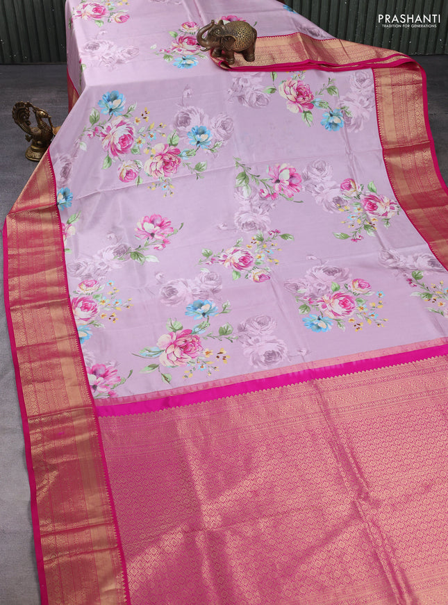 Pure kanchipuram silk saree pastel pink and pink with allover floral digital prints and rich zari woven border