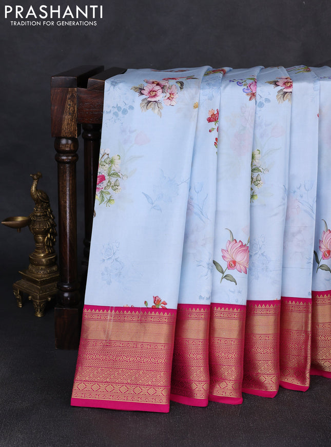 Pure kanchipuram silk saree pastel blue and pink with allover floral digital prints and rich zari woven border