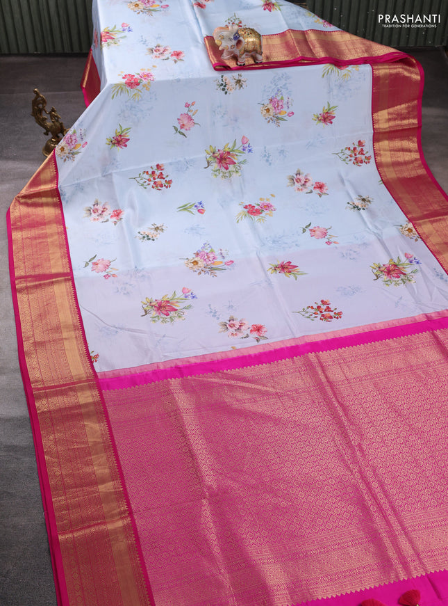 Pure kanchipuram silk saree pastel blue and pink with allover floral digital prints and rich zari woven border