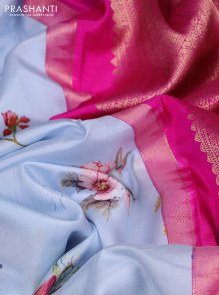 Pure kanchipuram silk saree pastel blue and pink with allover floral digital prints and rich zari woven border