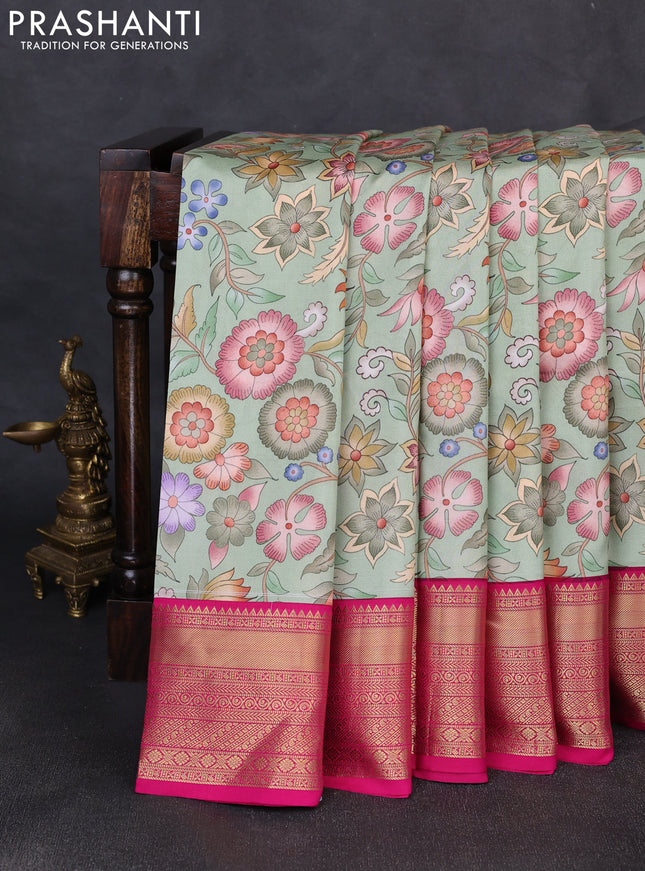 Pure kanchipuram silk saree pista greeb and pink with allover floral digital prints and rich zari woven border