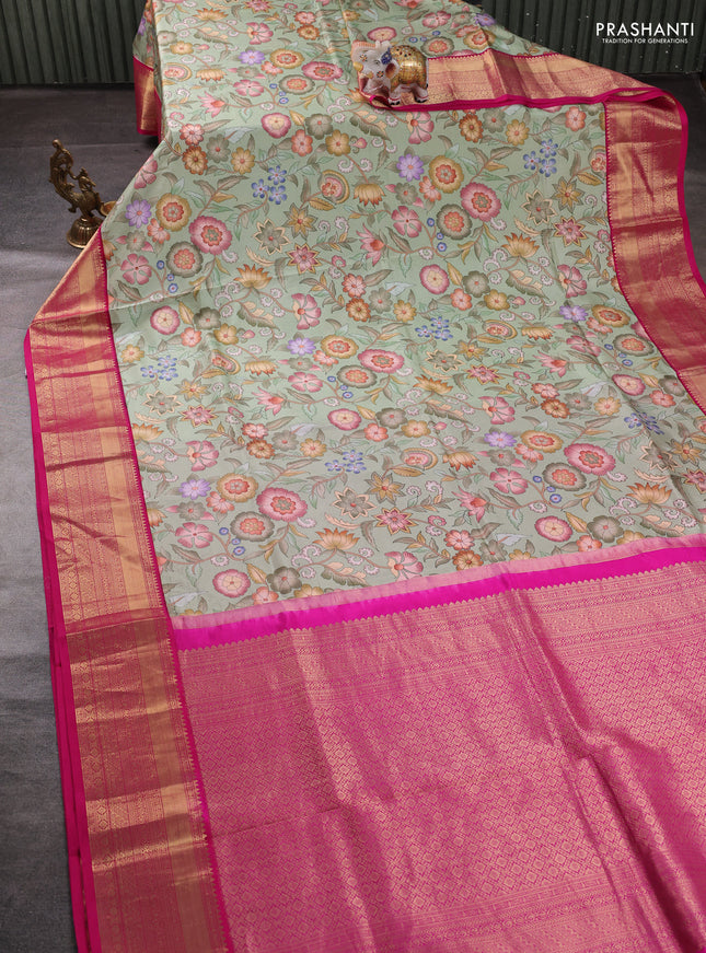 Pure kanchipuram silk saree pista greeb and pink with allover floral digital prints and rich zari woven border
