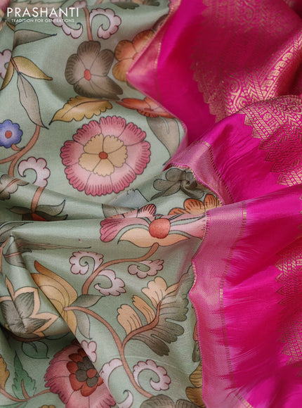 Pure kanchipuram silk saree pista greeb and pink with allover floral digital prints and rich zari woven border