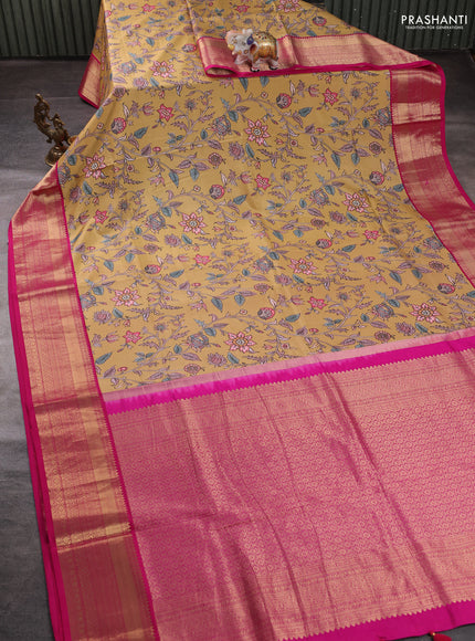 Pure kanchipuram silk saree mustard yellow and pink with allover floral digital prints and rich zari woven border