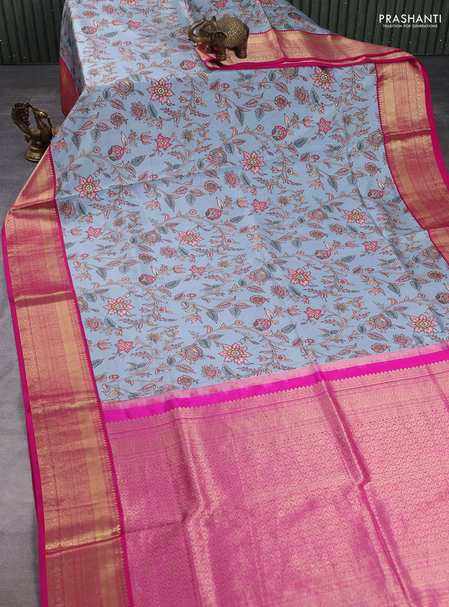 Pure kanchipuram silk saree pastel blue and pink with allover floral digital prints and rich zari woven border